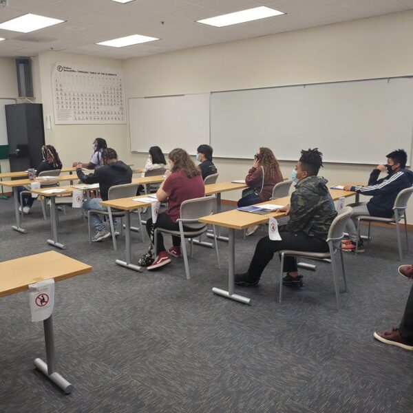 Project Grad students sittin in a classroom 